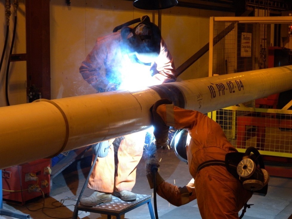 SC-300 on pipe as sections are being welded together 